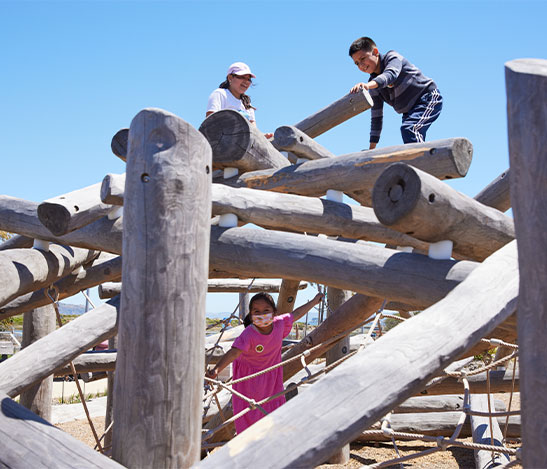 Kids using Outpost play area